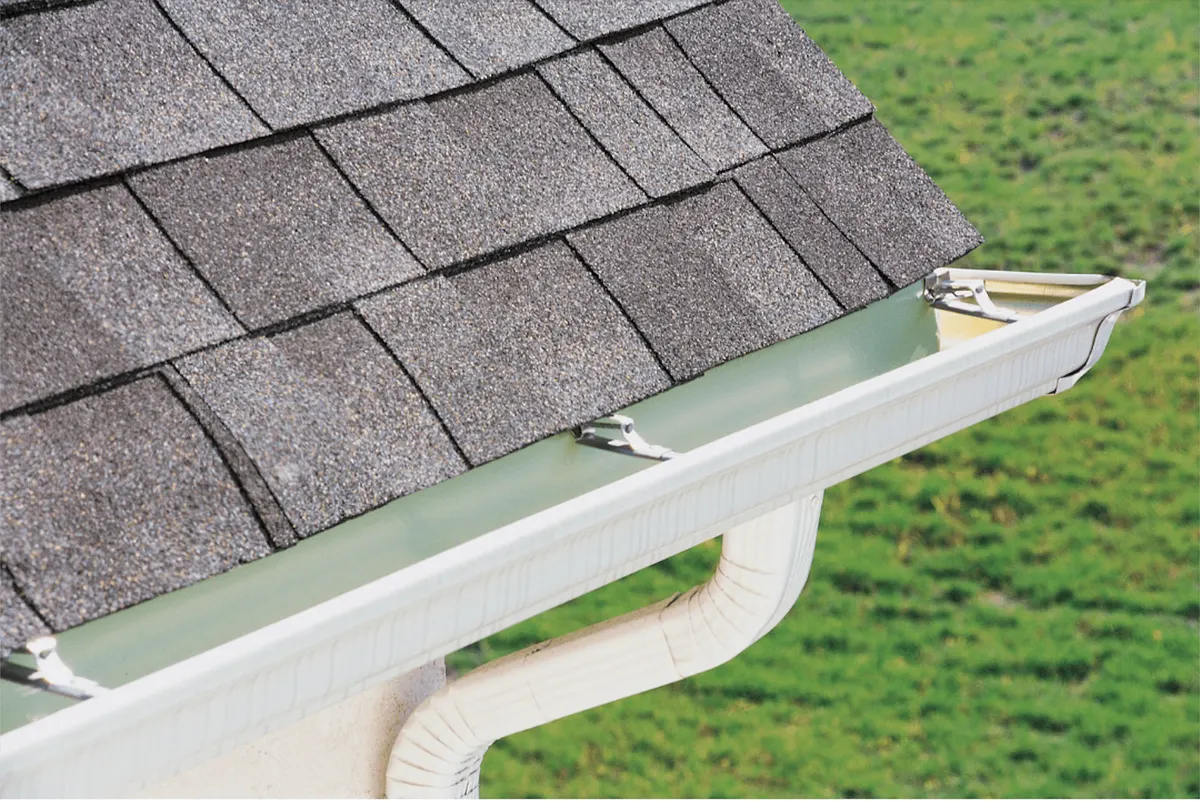Aging roofline and gutter ready for seamless replacement
